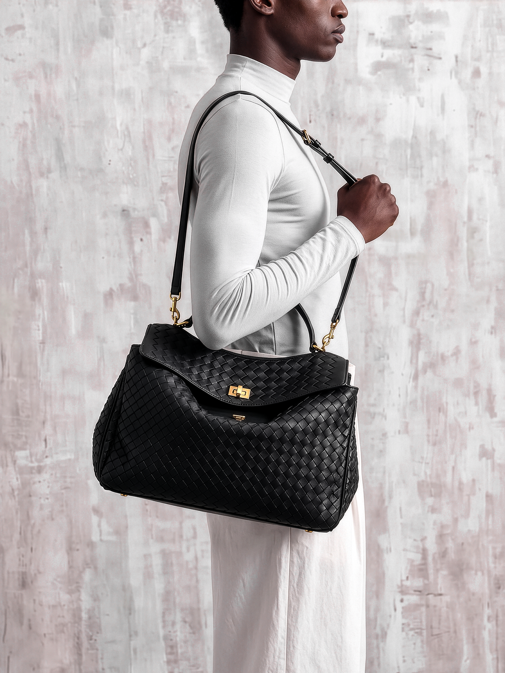 Soluta Black Woven Leather Top Handle Bag
