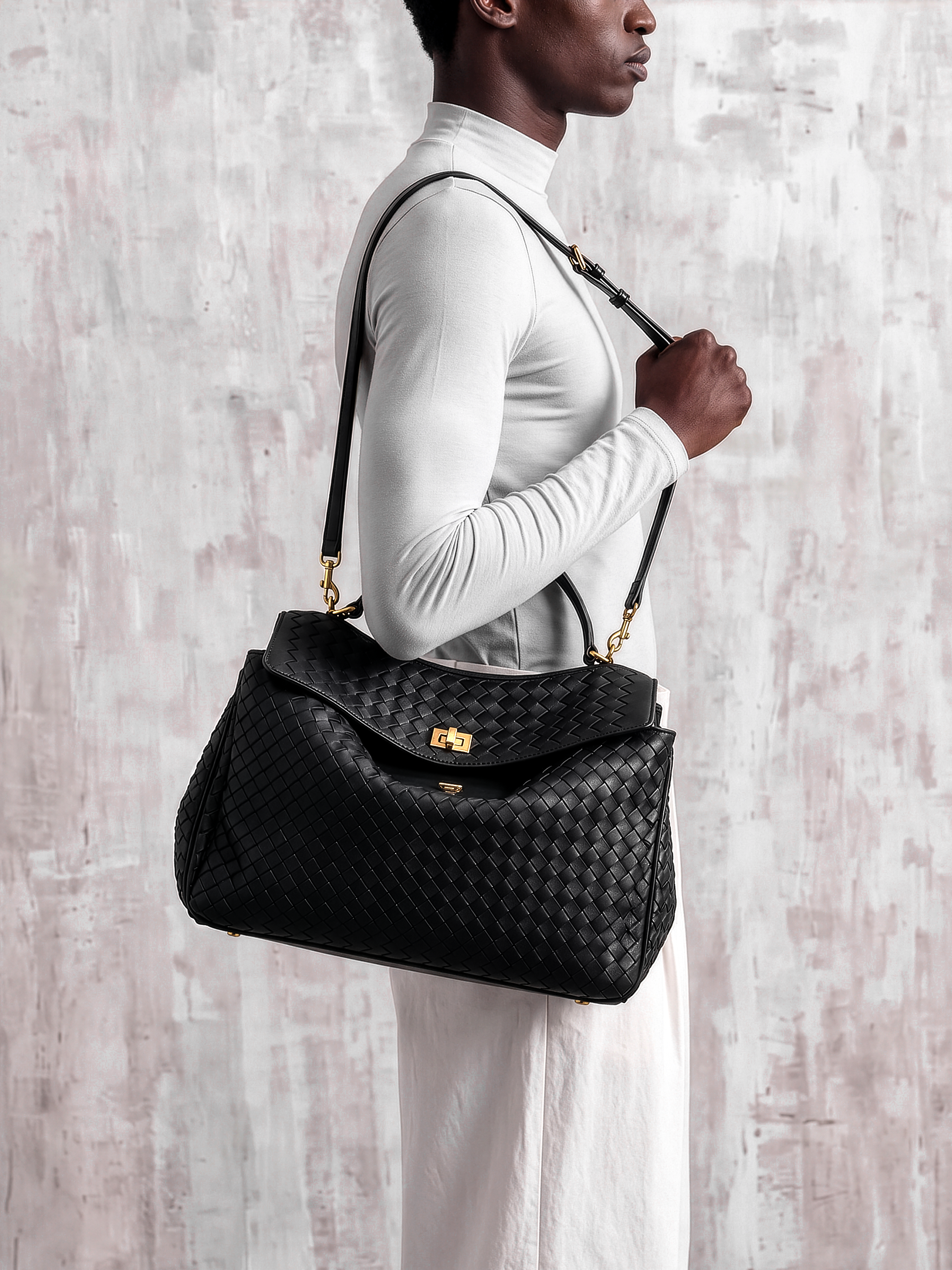 Soluta Black Woven Leather Top Handle Bag